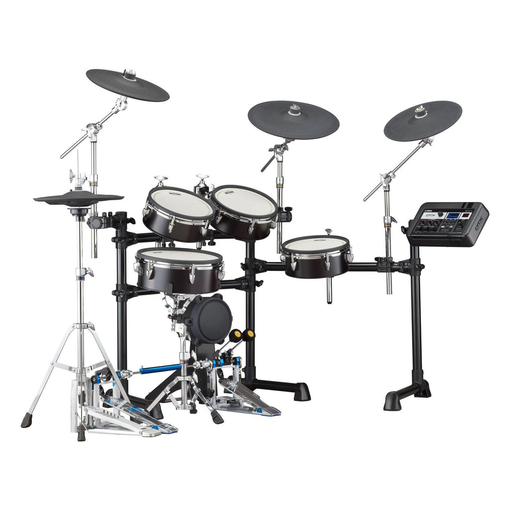 Yamaha DTX8K electronic drum kit in black forest finish with silicon pads, featuring drum modules and cymbals on a stand.