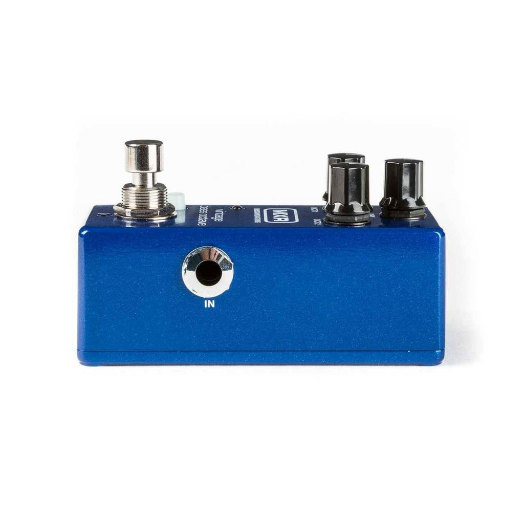 MXR M280 Vintage Bass Octave Effects Pedal with control knobs and input/output jacks on a black pedalboard.