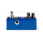 MXR M280 Vintage Bass Octave Effects Pedal with control knobs and input/output jacks on a black pedalboard.