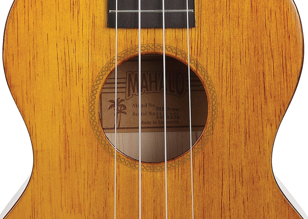 Mahalo Hano Series MH3 tenor ukulele in vintage natural wood finish, showing soundhole and detailed fretboard.