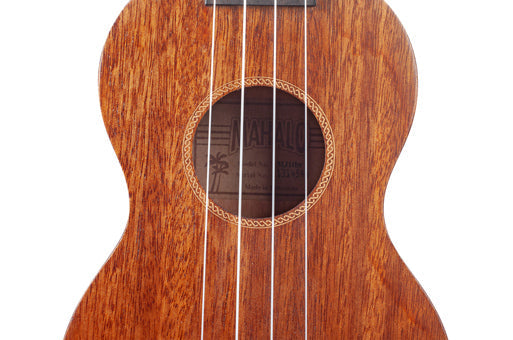 Mahalo MJ1TBR Java Series soprano ukulele in brown, showing the soundhole and wooden finish.