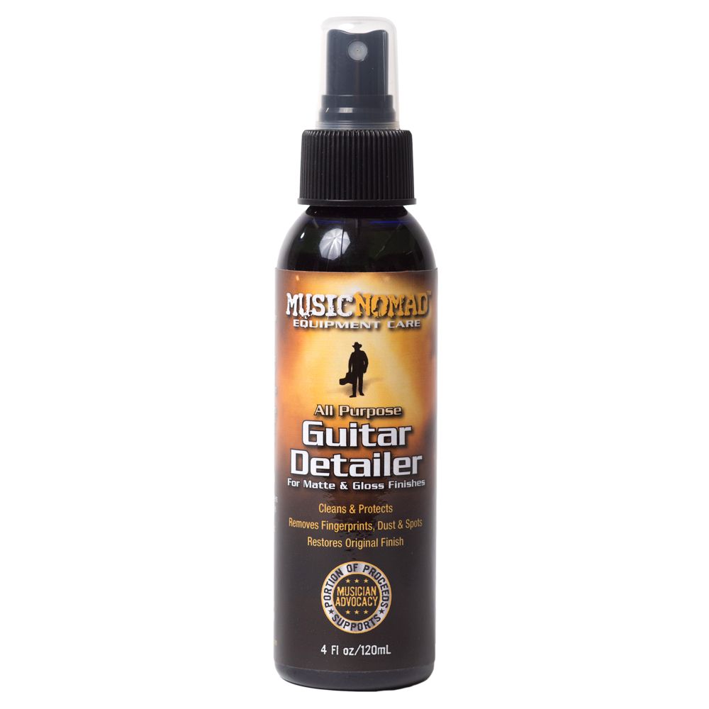 Music Nomad MN100 Guitar Detailer bottle with applicator for cleaning and polishing electric and acoustic guitars.