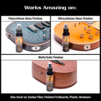 Music Nomad MN100 Guitar Detailer bottle showing cleaning solution for guitar maintenance and polishing accessories.