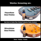 Music Nomad MN103 Guitar One Cleaner bottle showing label and applicator for cleaning and polishing electric and acoustic guitars.