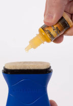 Music Nomad MN120 String Fuel refill for guitar accessories, showing the string cleaning and conditioning product in a close-up shot.