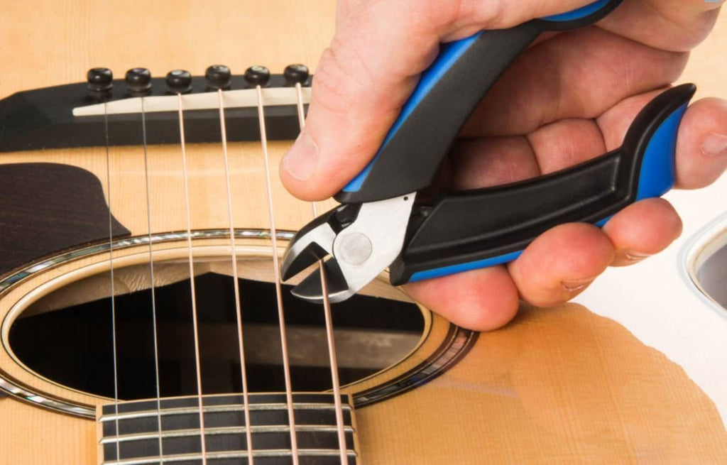 Music Nomad MN226 GRIP Cutter premium guitar string cutter with ergonomic grip and durable stainless steel blades.