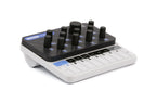 Modal Electronics Craft Monophonic Synth Module mounted in a synthesizer rack with control knobs and patch points.