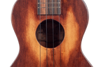 Mahalo Historic Series Tenor Ukulele with soundhole, showcasing its wood finish and classic design.