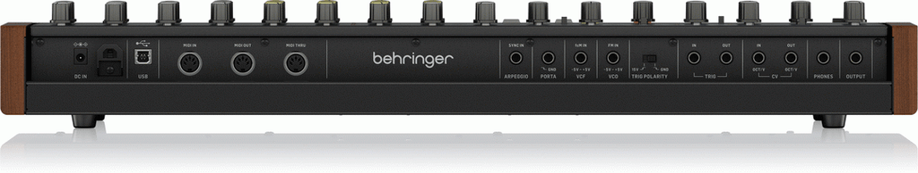 Behringer CM1A MIDI to CV converter module for synthesizer keyboards, shown with control knobs and input/output jacks.