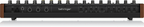Behringer CM1A MIDI to CV converter module for synthesizer keyboards, shown with control knobs and input/output jacks.