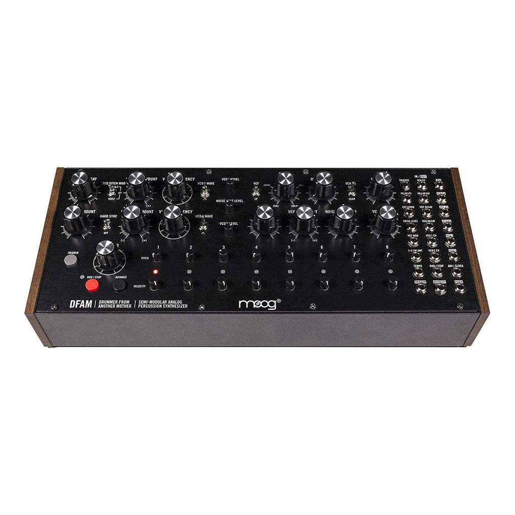 Moog DFAM semi-modular analog percussion synthesizer with drum pads and control knobs on a dark background.
