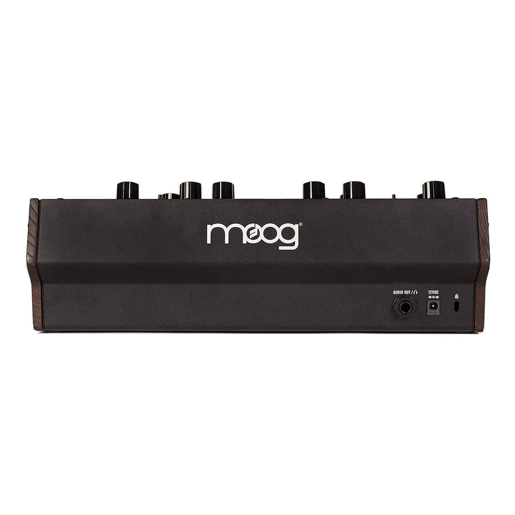 Moog DFAM semi-modular analog percussion synthesizer with knobs and patch points, used for drum machine sound creation.