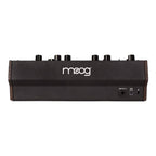 Moog DFAM semi-modular analog percussion synthesizer with knobs and patch points, used for drum machine sound creation.