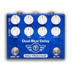 Mad Professor Dual Delay effects pedal shown on a pedalboard, featuring dual delay controls and true bypass switching.