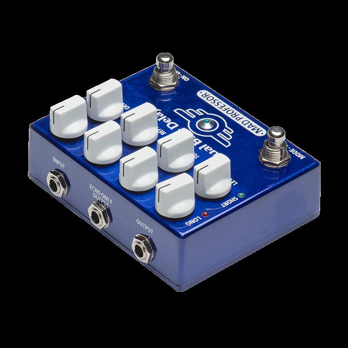 Mad Professor Dual Delay effects pedal shown with dual delay controls and input/output jacks on a black pedalboard.