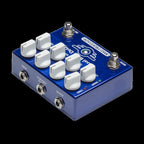 Mad Professor Dual Delay effects pedal shown with dual delay controls and input/output jacks on a black pedalboard.