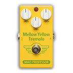 Mad Professor Mellow Yellow tremolo guitar effects pedal with control knobs and input/output jacks, black and yellow design, mounted on a pedalboard.