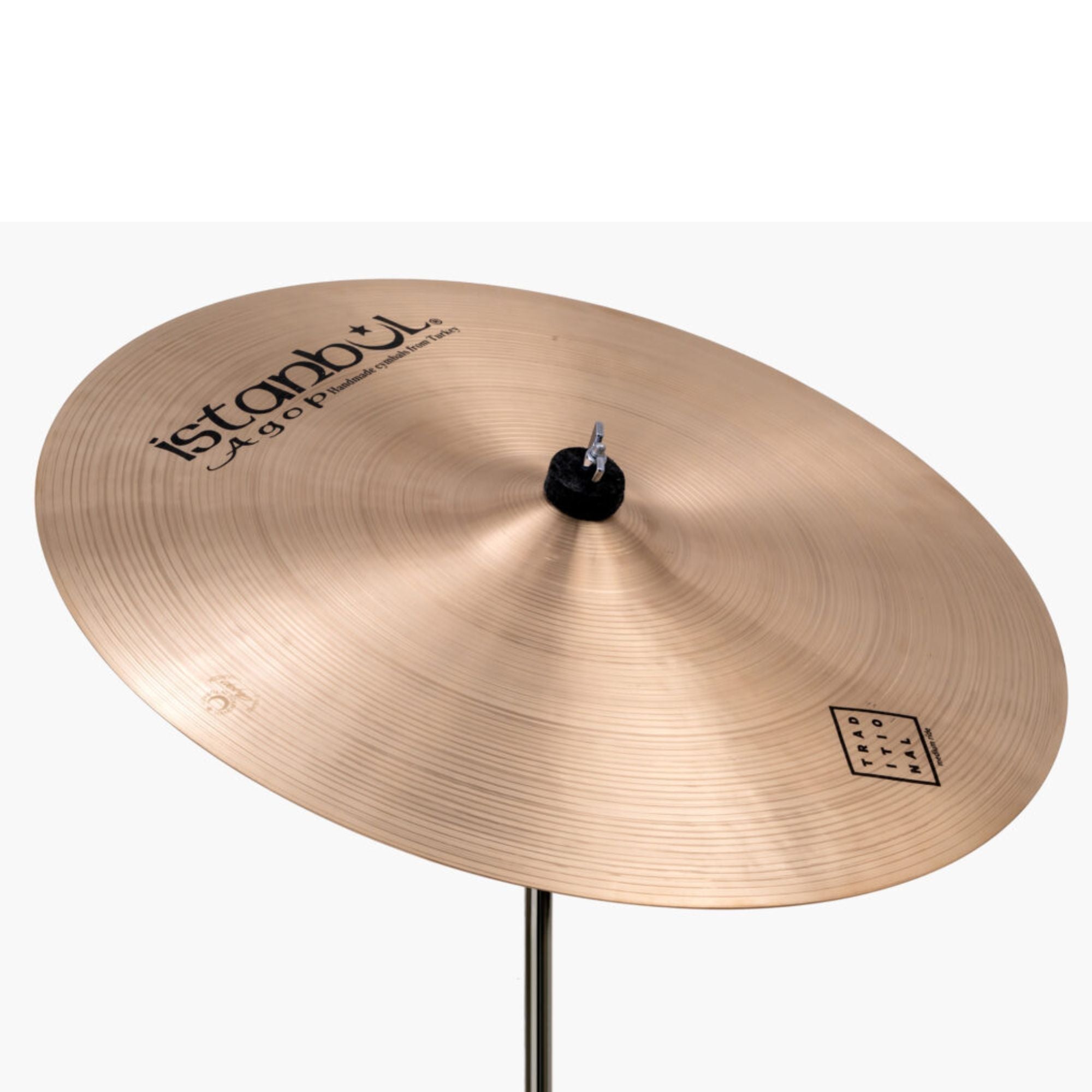 Istanbul Agop Istanbul 22-inch Traditional Medium Ride cymbal, single cymbal with a polished finish and detailed hammering pattern.