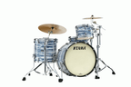 Tama Starclassic Maple 22-inch 3-piece drum kit shell pack in blue and white oyster finish with toms and bass drum visible
