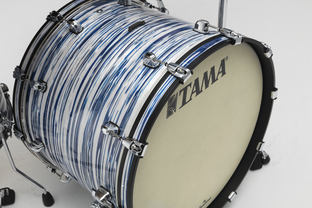 Tama Starclassic Maple 22-inch 3-piece drum kit shell pack in blue and white oyster finish, including bass, rack, and floor tom drums