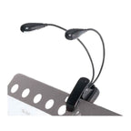 AMS MSL2 music stand light attached to a black music stand, providing adjustable LED illumination for sheet music.