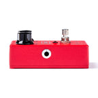 MXR Dyna Comp guitar effects pedal with control knobs and input/output jacks, compact effects pedal for dynamic compression.