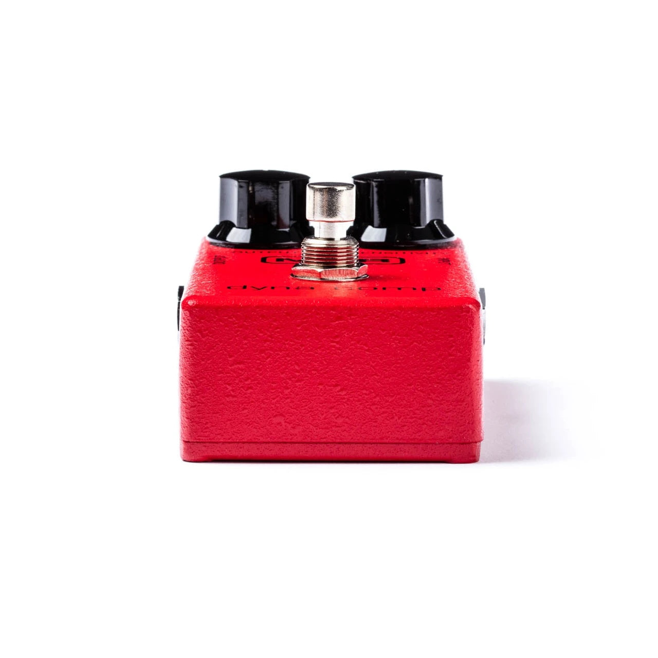 MXR Dyna Comp guitar effects pedal with controls and connection jacks, used for dynamic compression in electric guitar setups.