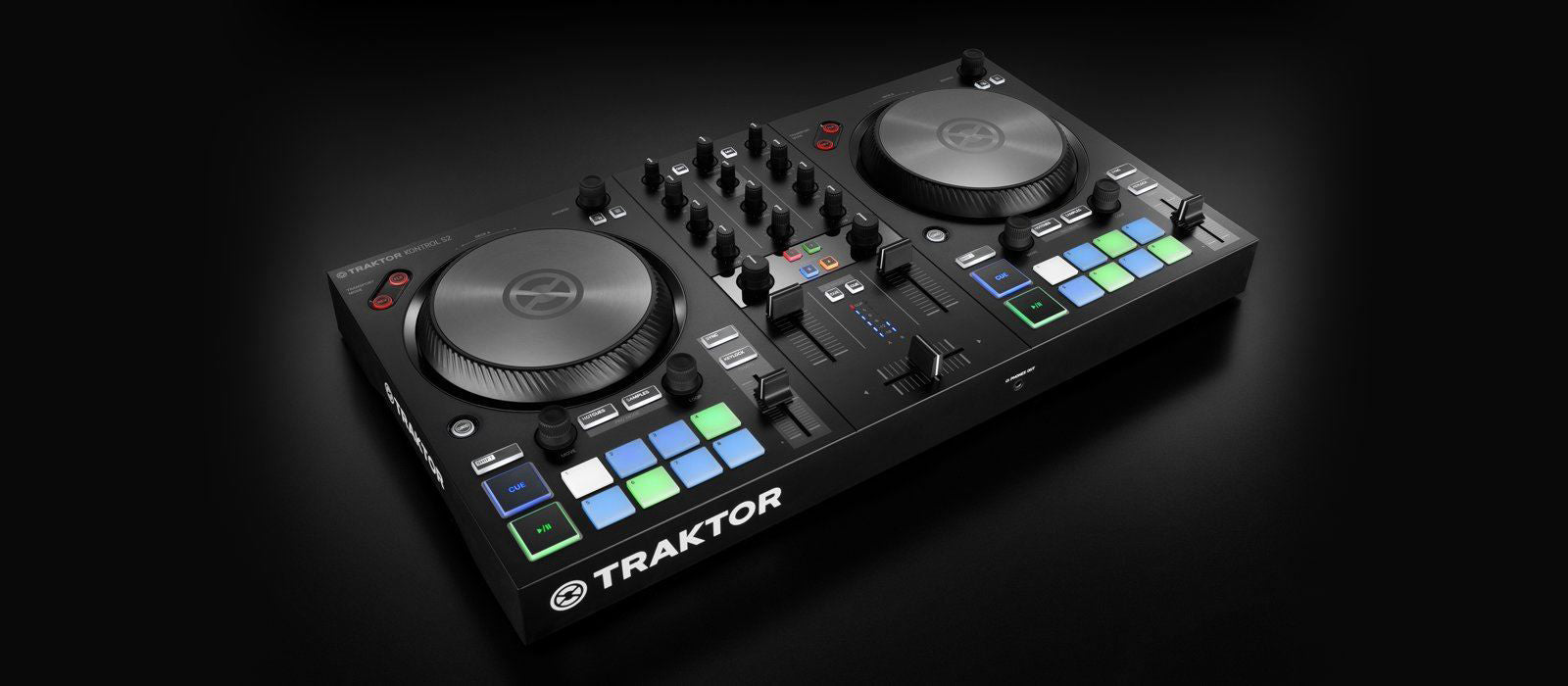 Native Instruments Traktor Kontrol S2 MK3 DJ controller with dual decks, knobs, jog wheels, and input ports for DJ mixing setup.