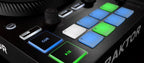 Native Instruments Traktor Kontrol S2 MK3 2-deck DJ controller with jog wheels, knobs, and buttons for professional DJ mixing.