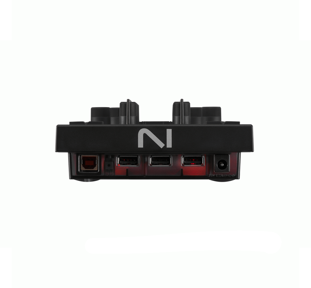 Native Instruments Traktor Kontrol X1 MK3 DJ controller with jog wheels, buttons, and knobs for professional DJ mixing.