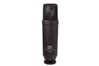Rode NT1 Studio Condenser Microphone Kit with microphone, shock mount, and accessories on a recording studio setup.