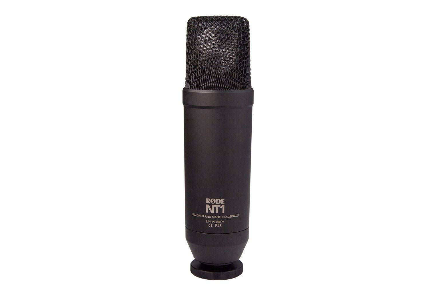 Rode NT1 Studio Condenser Microphone Kit with microphone, shock mount, and accessories on a recording studio setup.