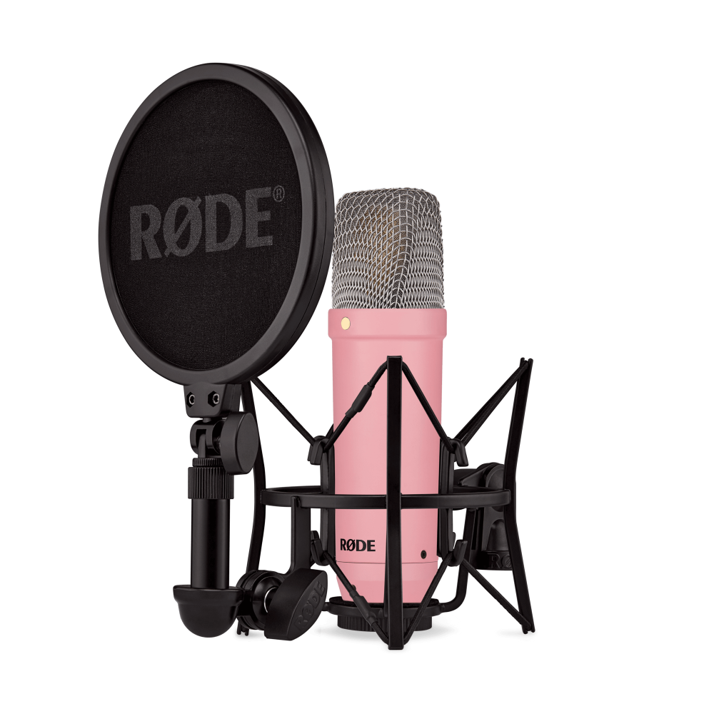 Rode NT1 Signature pink studio condenser microphone with silver grille and Rode branding, ideal for professional recording.