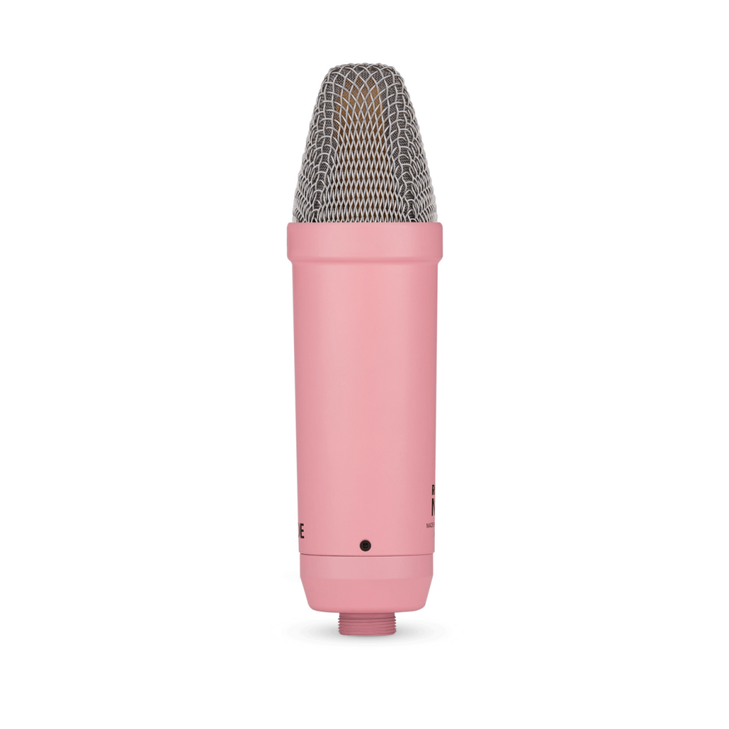 Pink Rode NT1 Signature studio condenser microphone with sleek design and gold accents, ideal for professional recording and vocals.