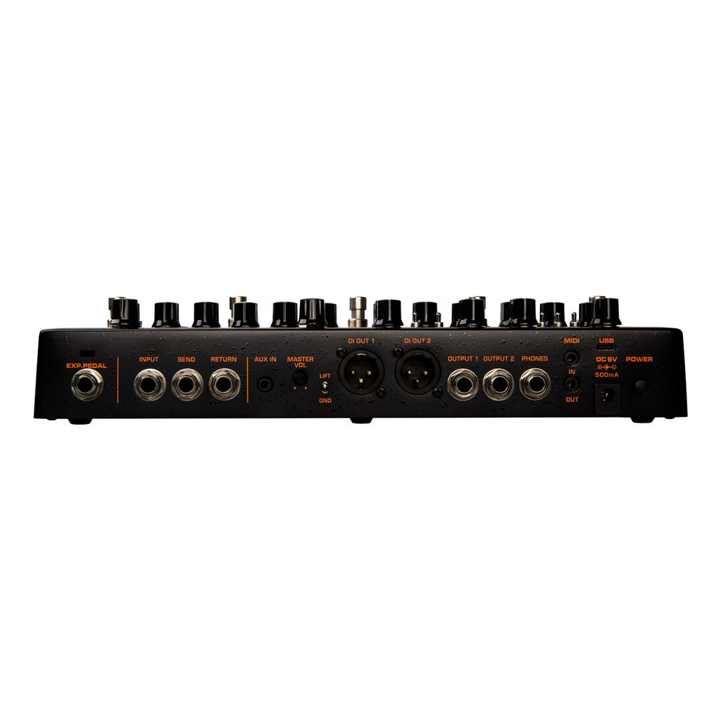 NUX NME-5 Trident guitar effects and modeling processor with multiple effect pedals on a wooden surface.