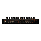 NUX NME-5 Trident guitar effects and modeling processor with multiple effect pedals on a wooden surface.