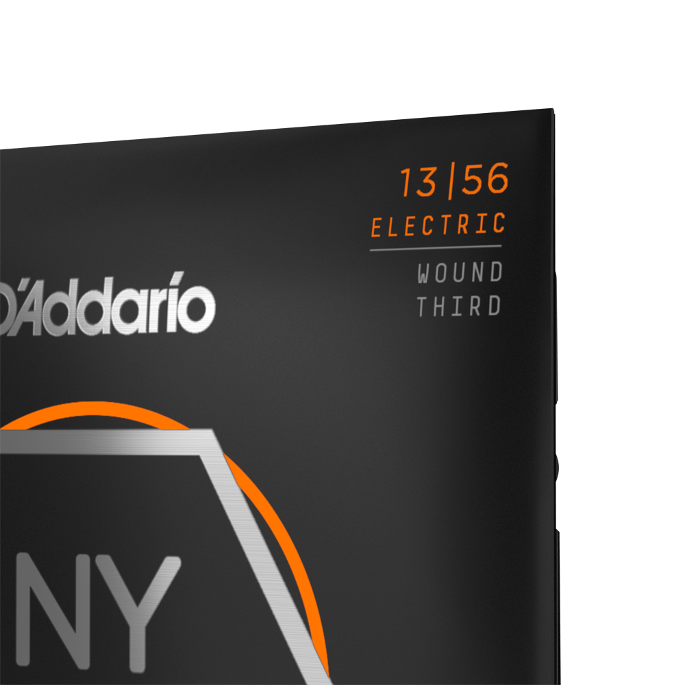 D'Addario NYXL1356W Nickel Wound Electric Guitar Strings set, medium wound 3rd string, 13-56 gauge, arranged on a guitar bridge.