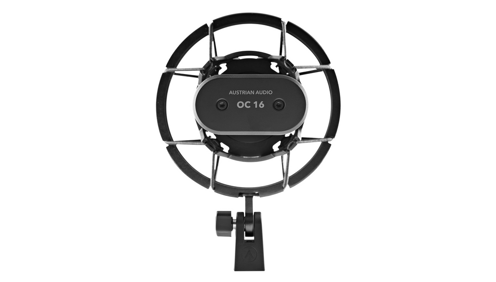 Austrian Audio OC16 studio microphone with spider mount, showing the microphone's sleek design and professional mounting setup.