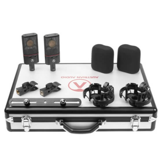 Pair of Austrian Audio OC18 studio microphones with spider mounts and stereo mounts, ideal for professional recording setups.