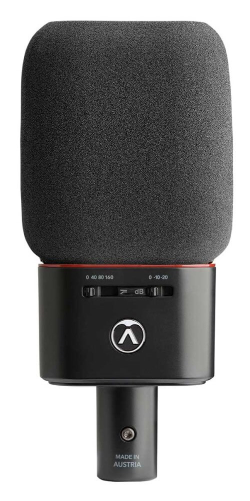 Pair of Austrian Audio OC18 studio microphones with spider mounts and stereo mount, ideal for professional recording setups.