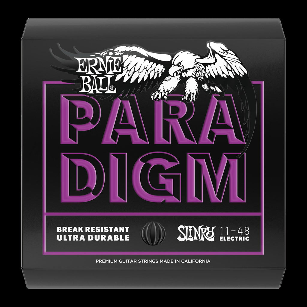 Ernie Ball Paradigm Power Slinky electric guitar strings shown on the package, designed for durable and high-quality sound.