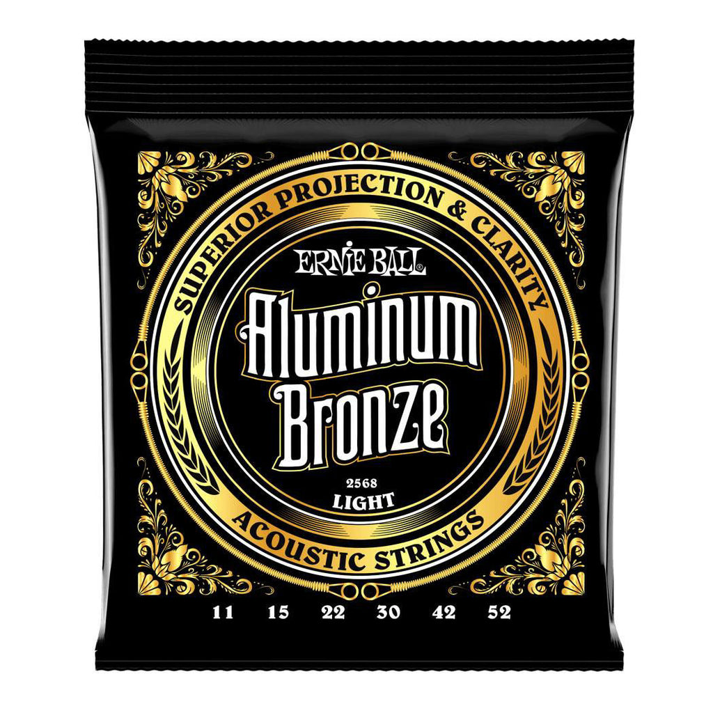 Ernie Ball 2568 light aluminum bronze acoustic guitar strings shown on a guitar, highlighting their bright finish and packaging.