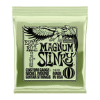 Ernie Ball Magnum Slinky Electric Guitar Strings in olive, 12-56 gauge, displayed with packaging and guitar in the background.