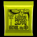 Ernie Ball 2621 Regular Slinky 7-string nickel wound electric guitar strings on a guitar, showcasing the product and packaging.