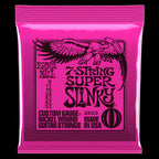 Ernie Ball 2623 Super Slinky 7-string nickel wound electric guitar strings on a guitar, showcasing the shiny metallic strings.