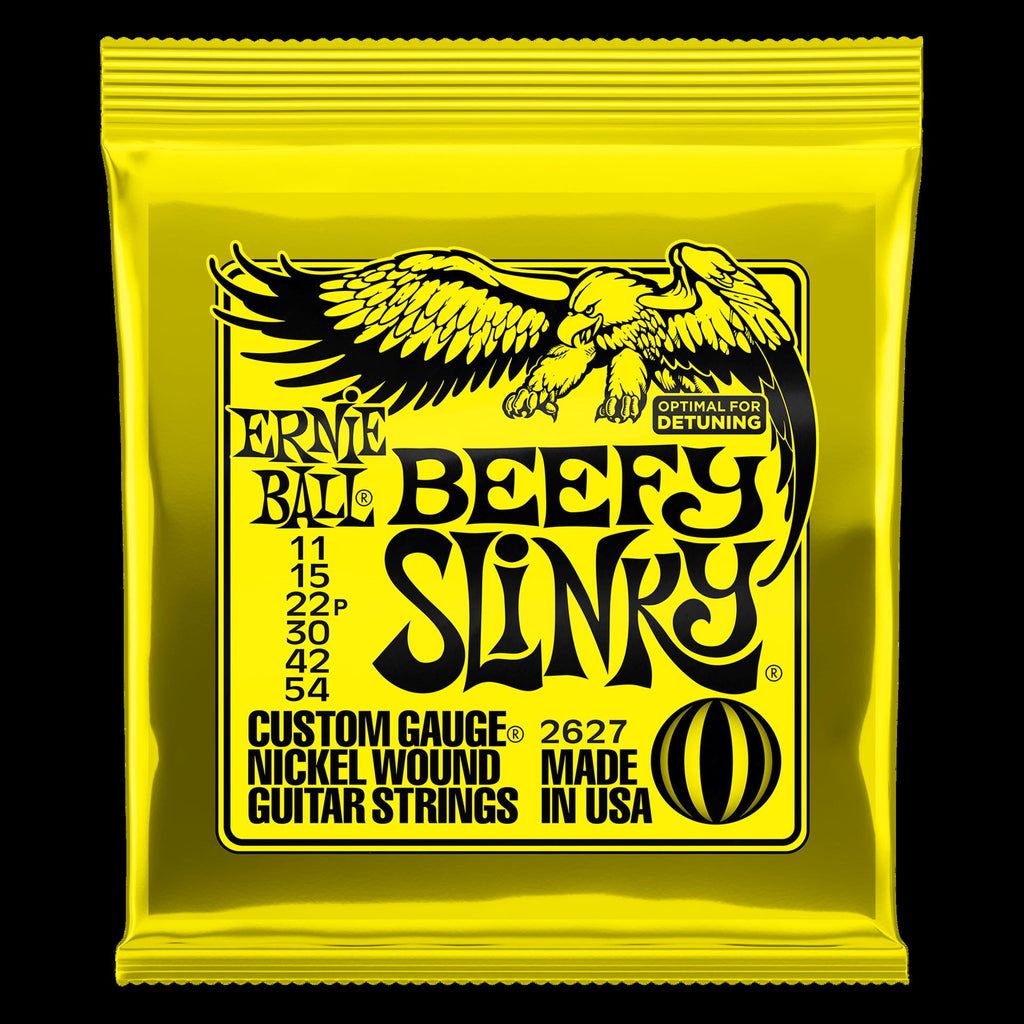 Electric guitar strings by Mega Music, Ernie Ball 2627 Beefy Slinky Nickel Wound set, showing the packaged strings for electric guitars.