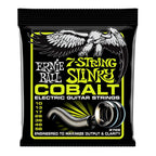 Ernie Ball 2728 10-56 Regular Slinky 7-string cobalt electric guitar strings on a guitar, showcasing the string set and packaging.