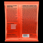 Ernie Ball Slinky Long Scale 6-String Nickel Wound Electric Bass Strings laid out on a white background.