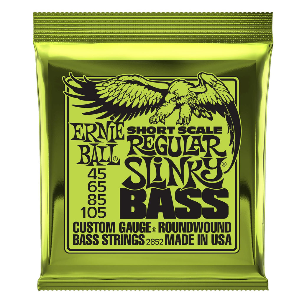 Close-up of Ernie Ball 2852 Regular Slinky short scale bass guitar strings, showing the packaging and string details.