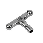 Pearl Pearl K-080 drum tuning key attached to drum hardware for tuning and adjustments. Durable metal construction.